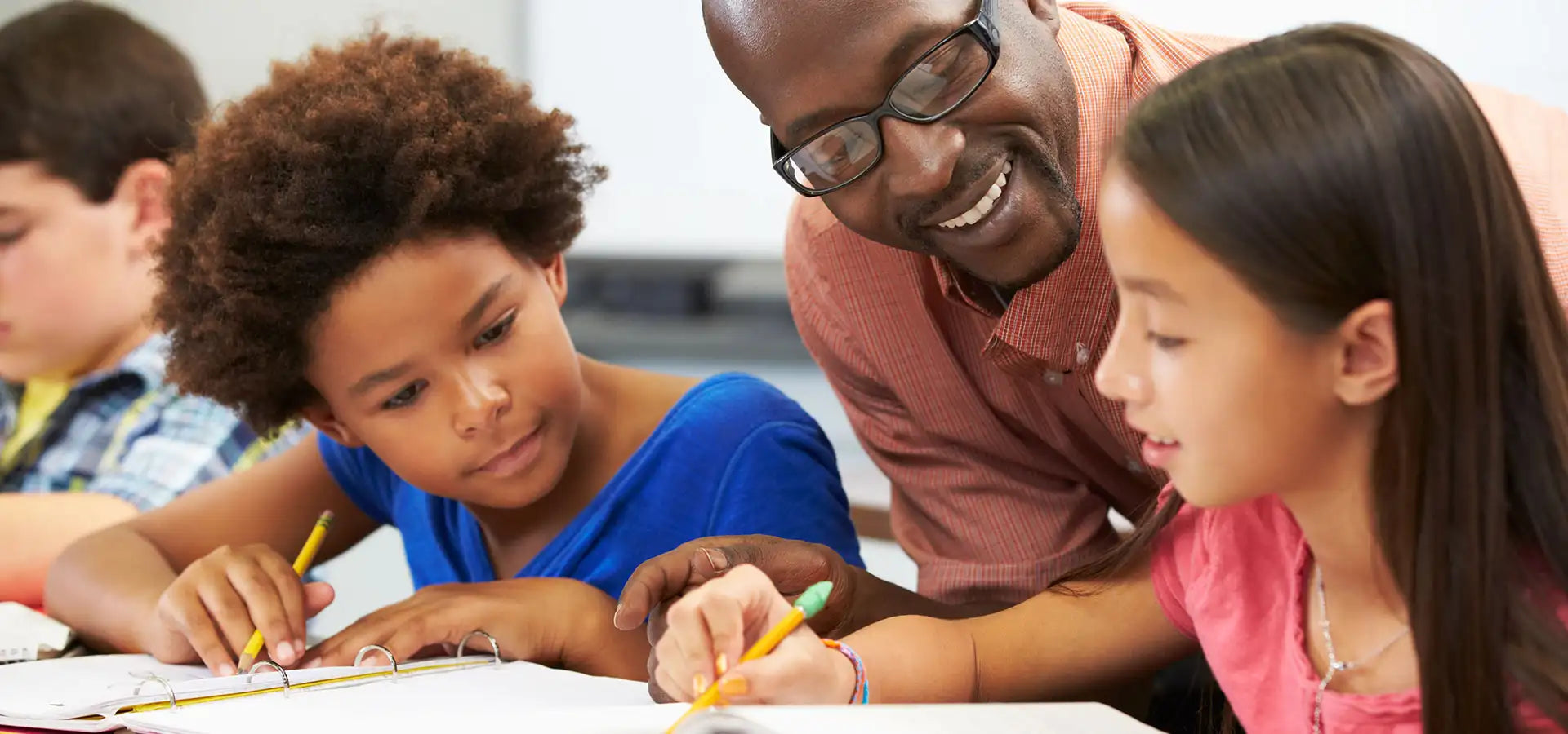 teacher with students in classroom