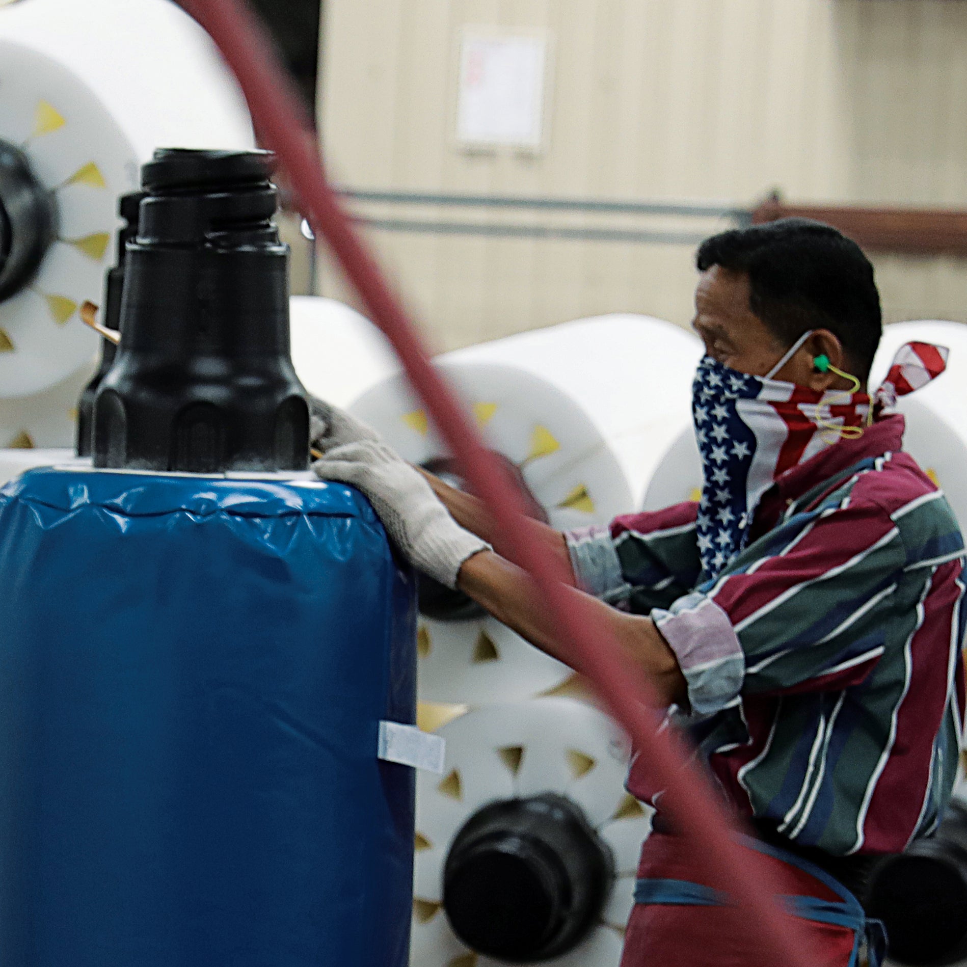 Man Building Wavemaster Punching Bag