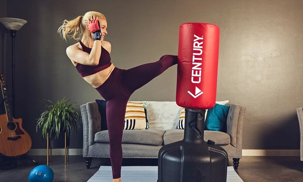 female kicking wavemaster at home