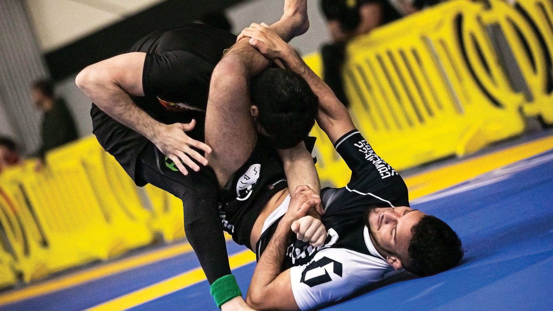 Grapplers training in Gameness rash guards