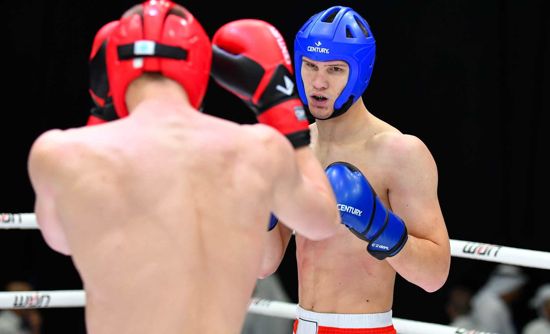 men sparring in century gear