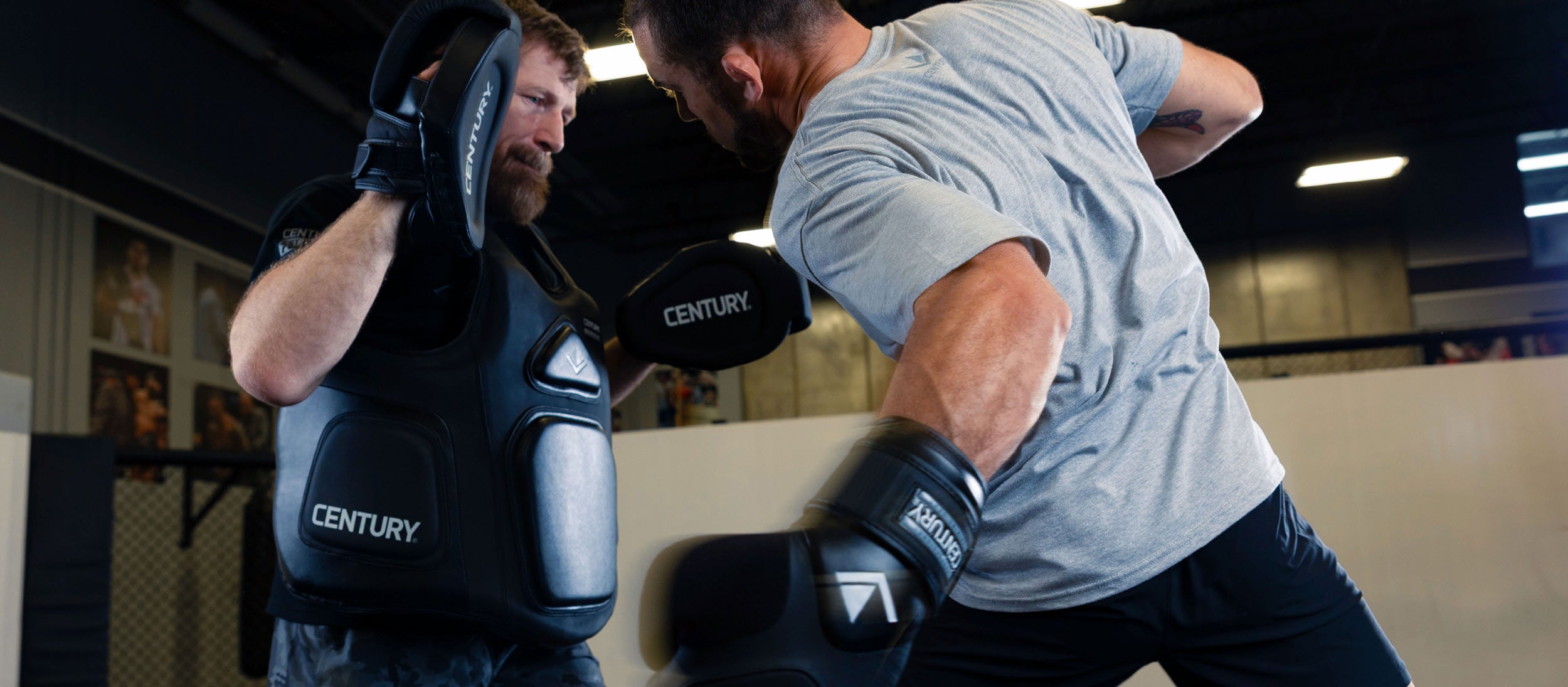 men sparring with creed gear