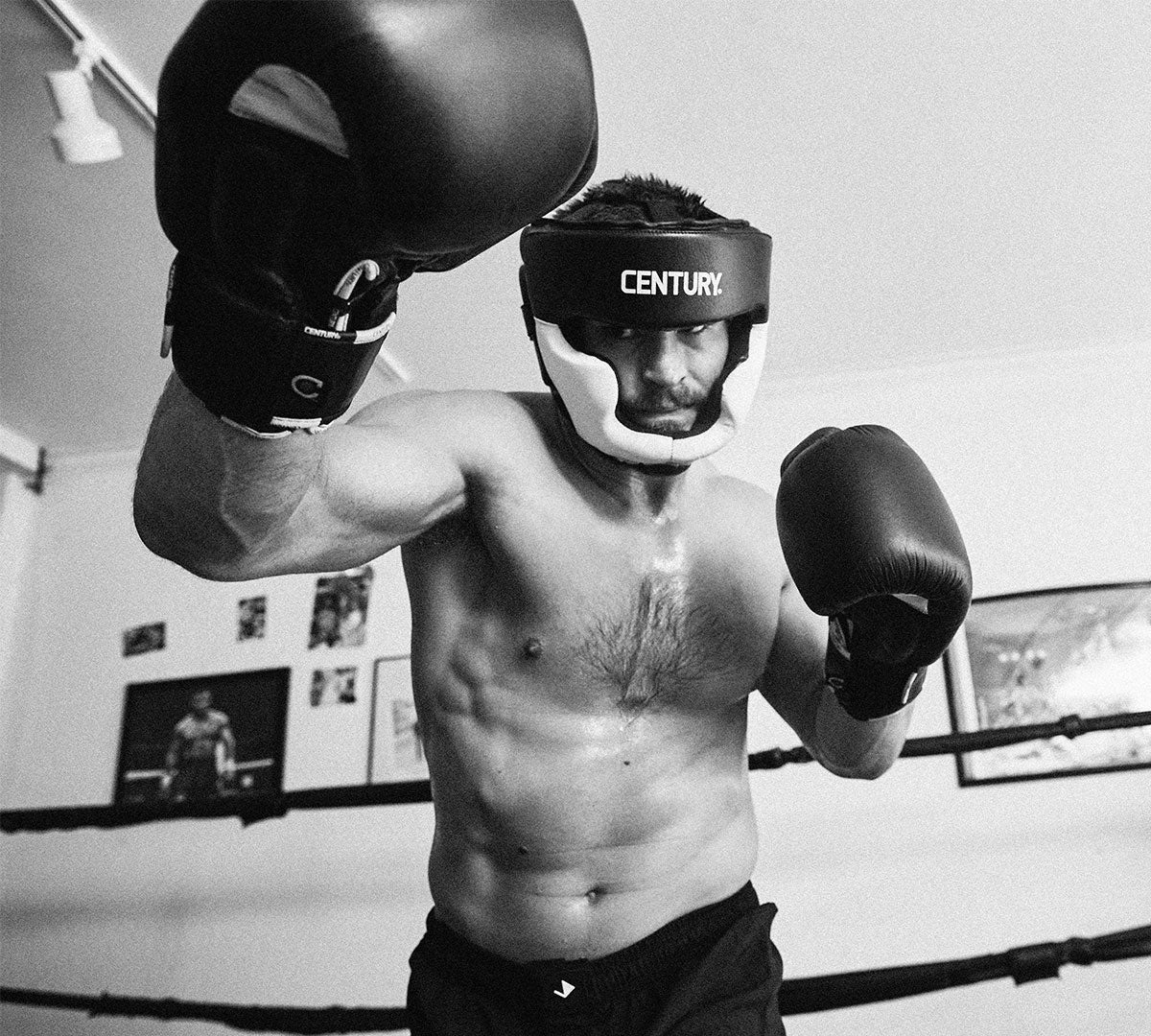 man boxing in black and white photo